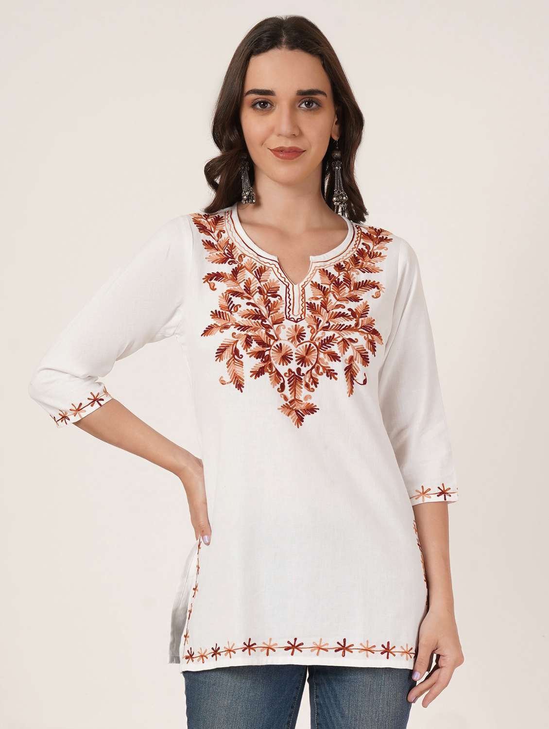women embroidered three quarter sleeve kurti