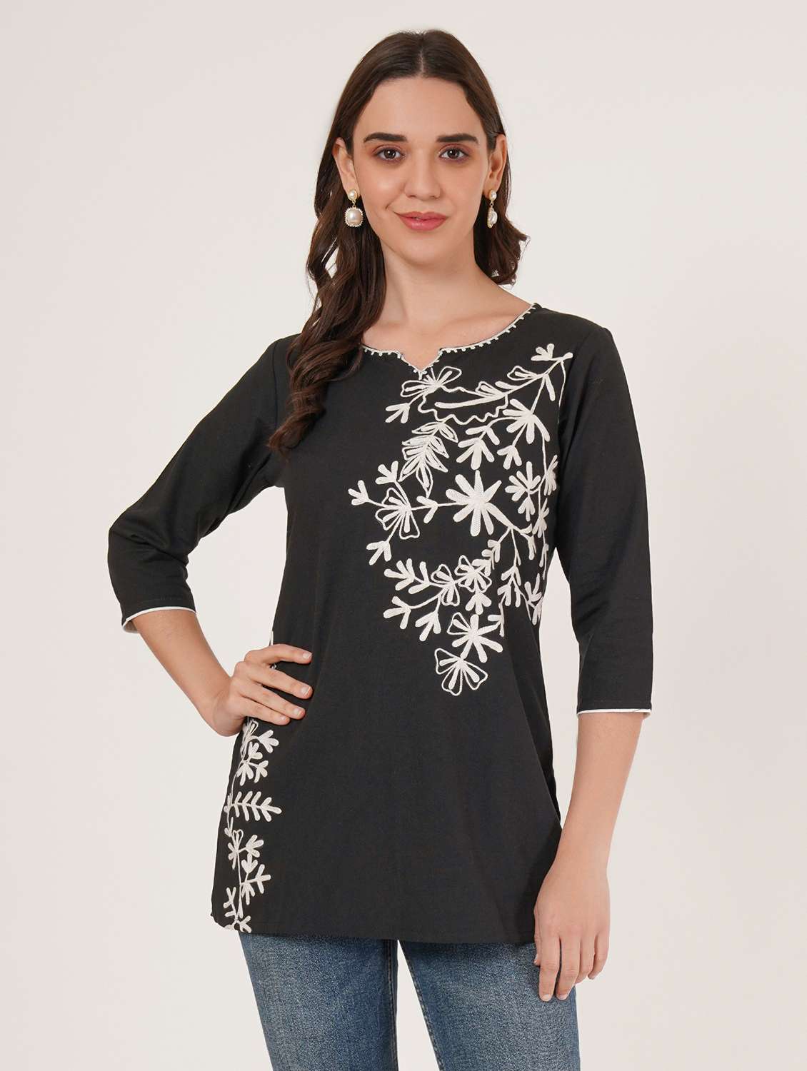 women embroidered three quarter sleeve kurti