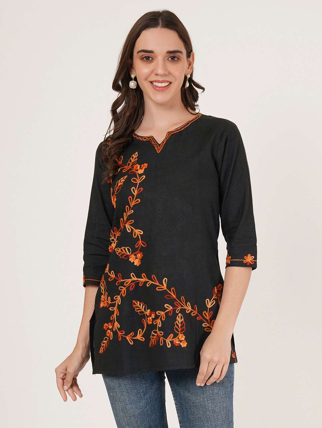 women embroidered three quarter sleeve kurti