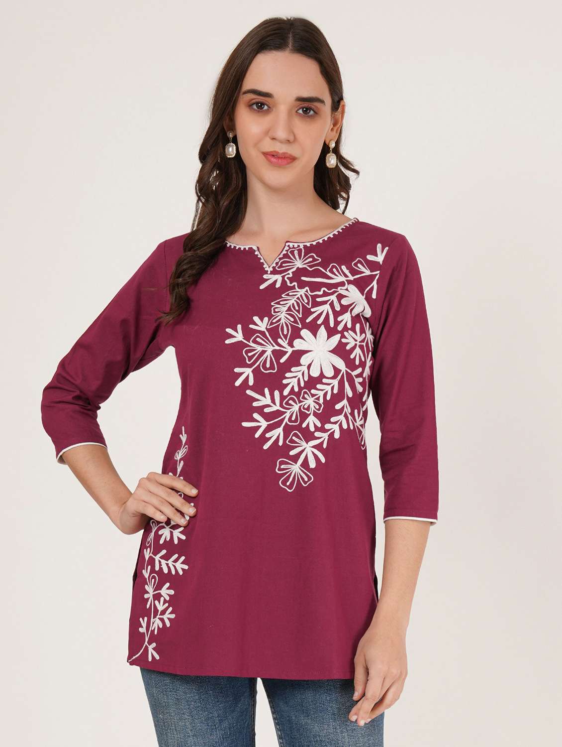 women embroidered three quarter sleeve kurti