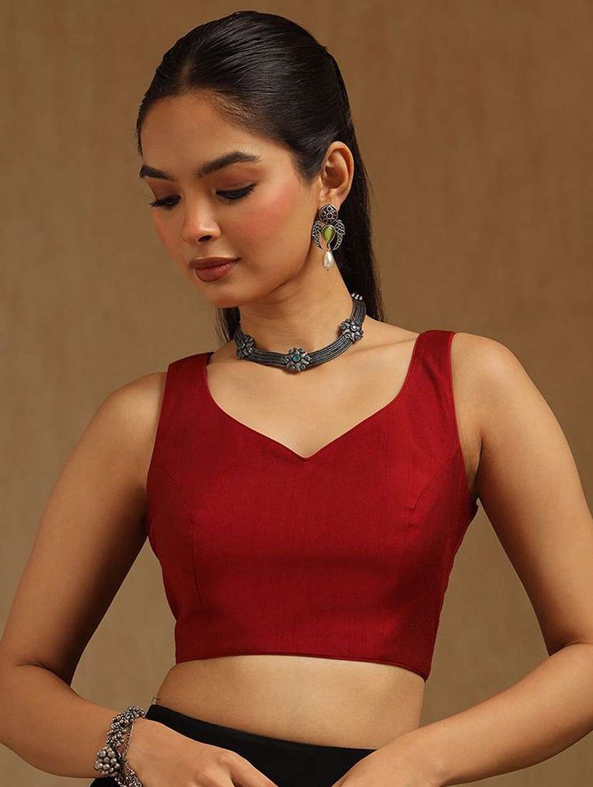 women solid sleeveless stitched blouse