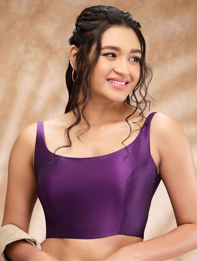 women solid sleeveless stitched blouse