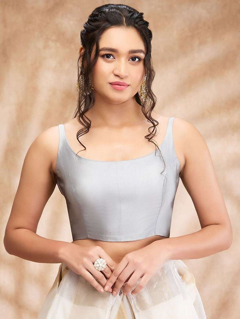 women solid sleeveless stitched blouse