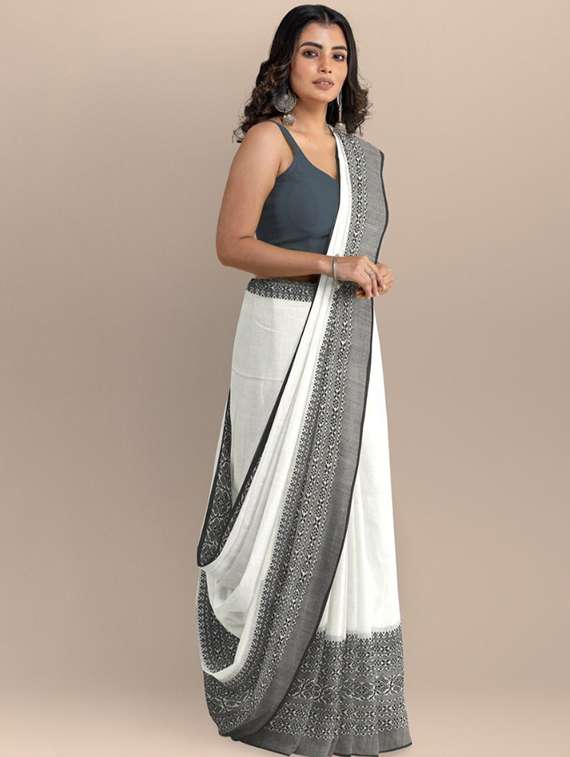 women solid with bordered handloom saree with blouse - 22081839 -  Standard Image - 1