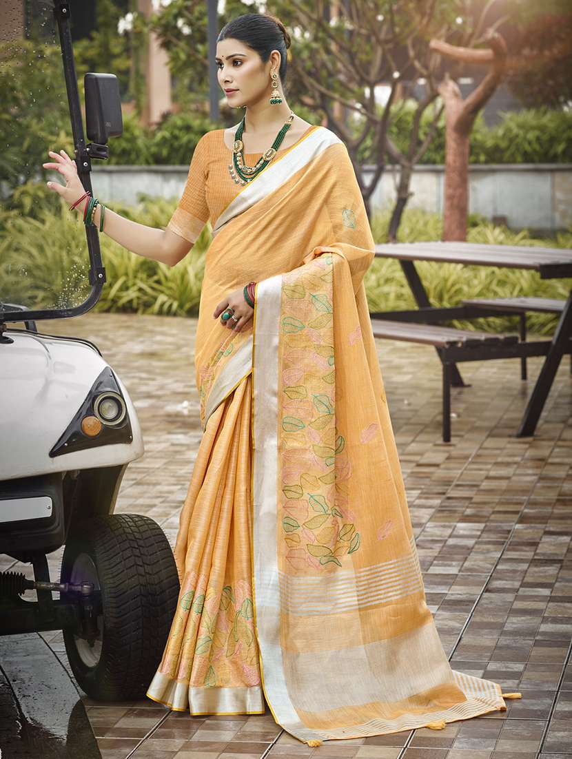 women solid with work embroidered saree with blouse