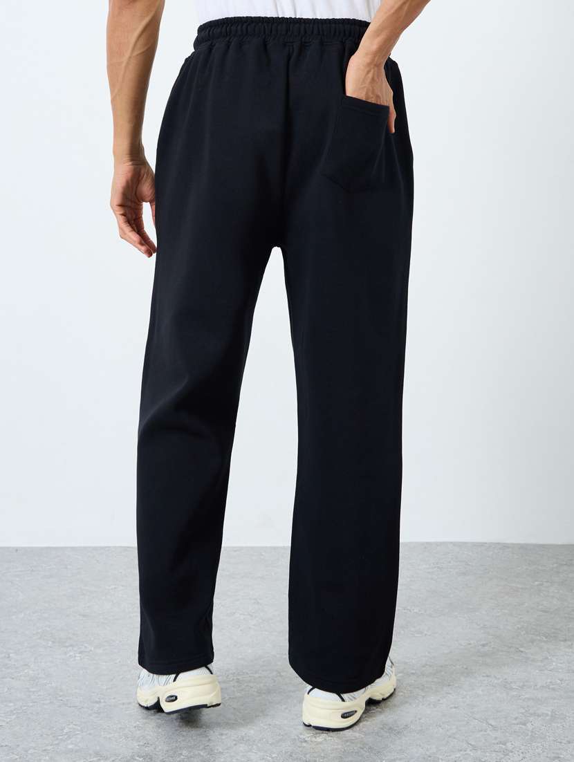 men solid mid rise full length track pant - 22083319 -  Standard Image - 1