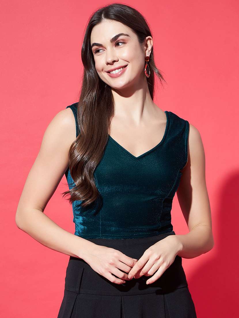 women solid sleeveless stitched velvet blouse