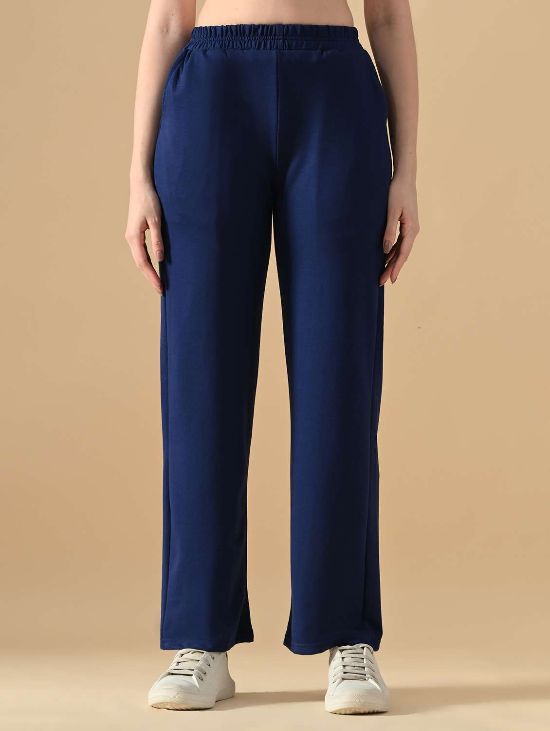 women solid mid rise relaxed fit track pant