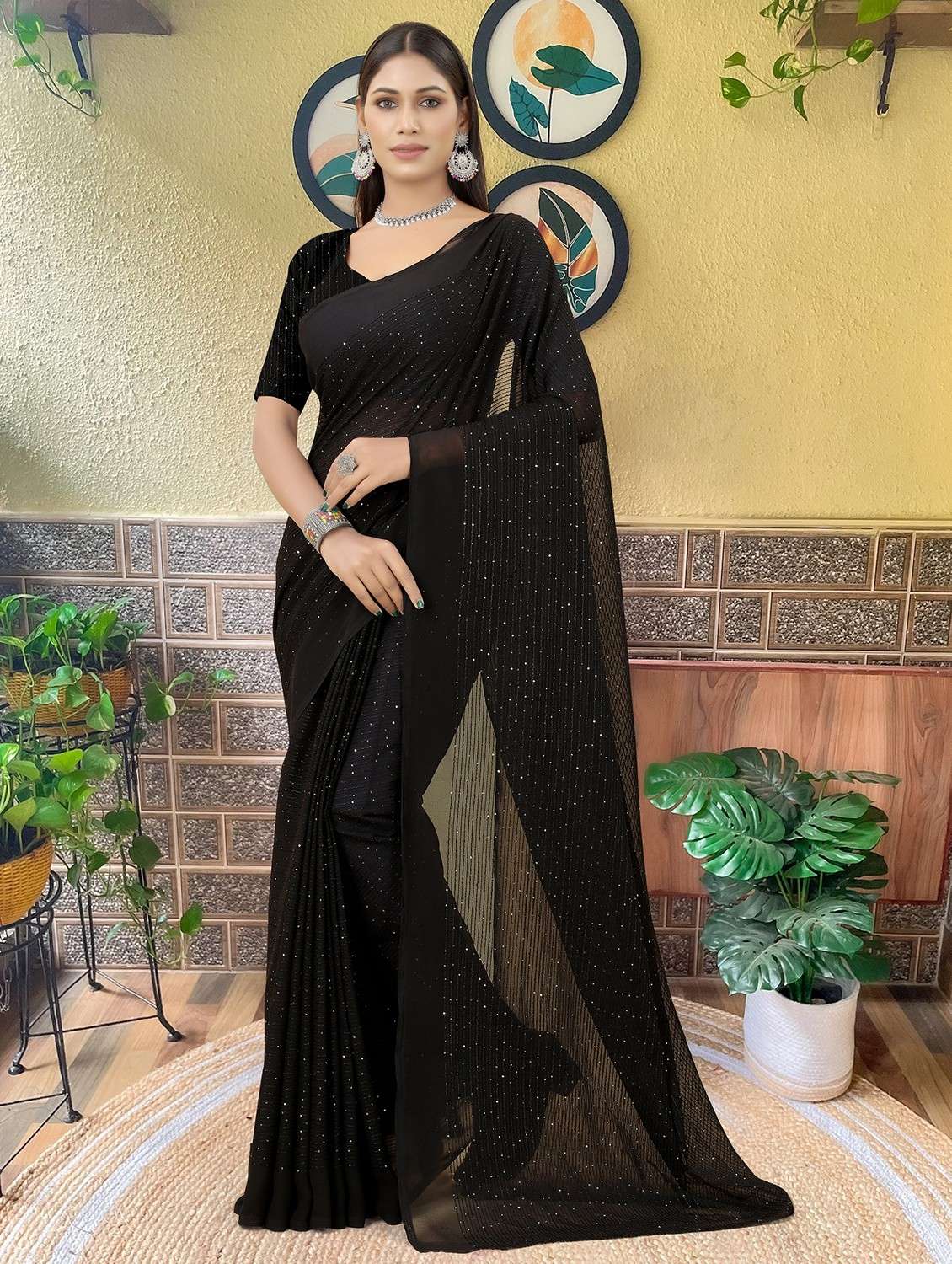 women solid with work embellished saree with blouse