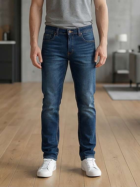 men washed high rise full length tapered jeans