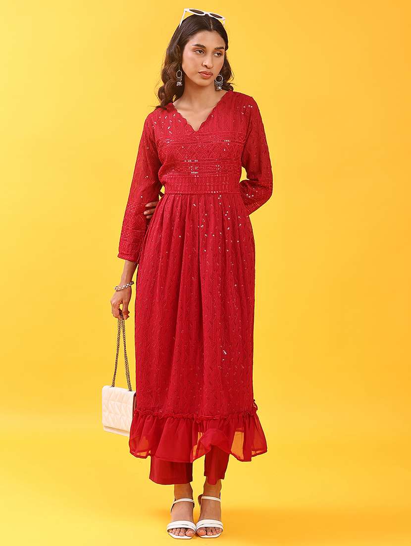 women embroidered long sleeve kurta and pant set