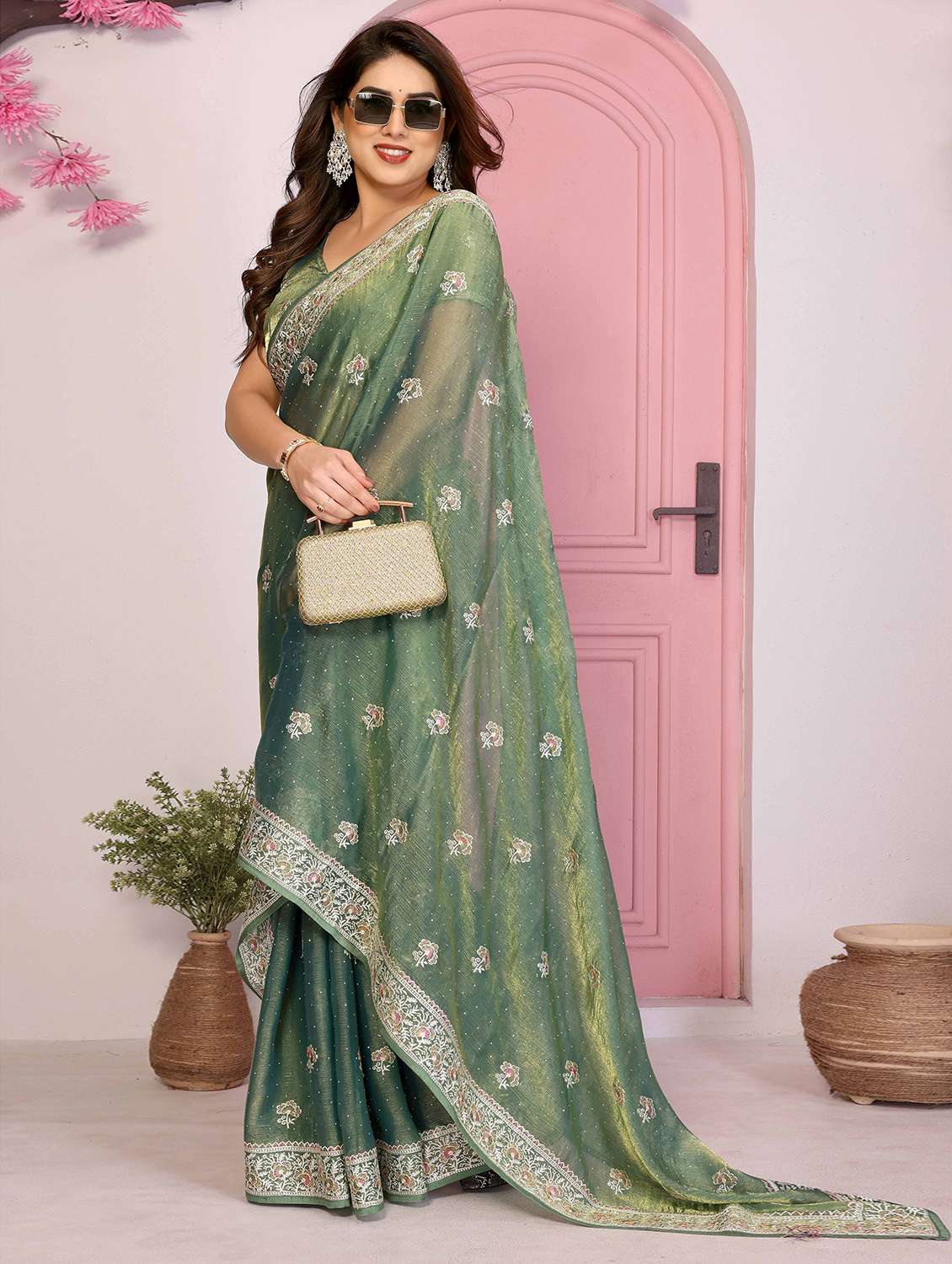 women solid with work embroidered saree with blouse
