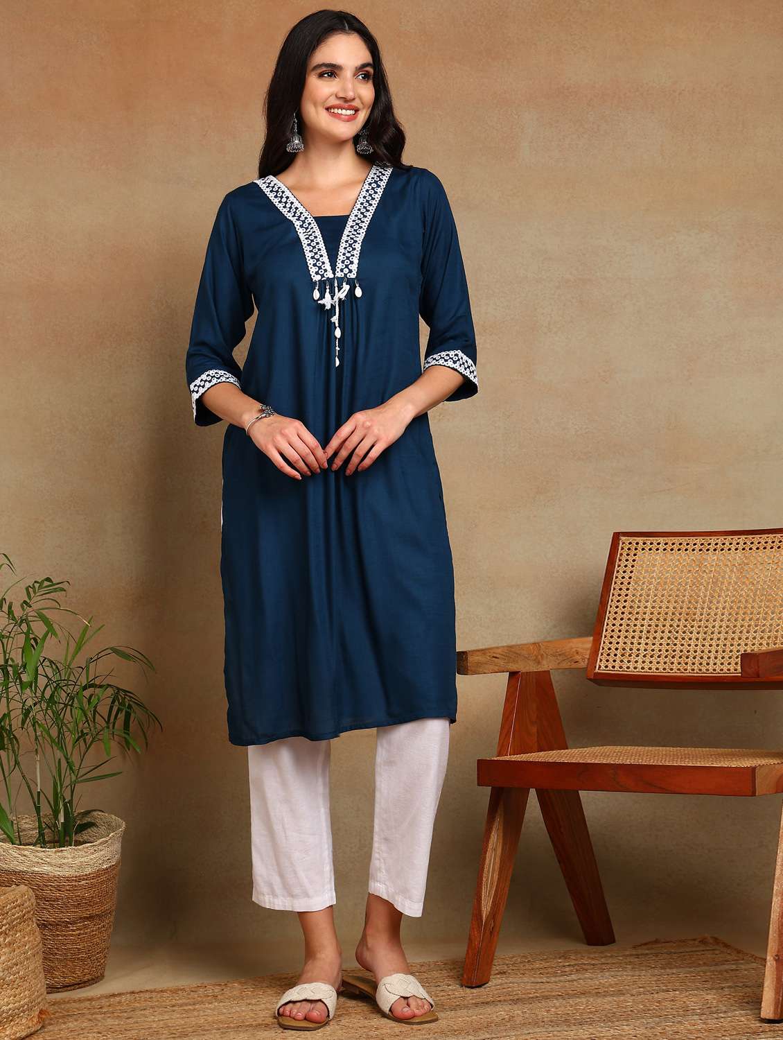 women solid with work three quarter sleeve a-line kurta