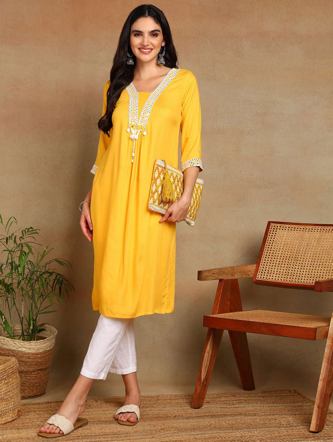 women solid with work three quarter sleeve a-line kurta