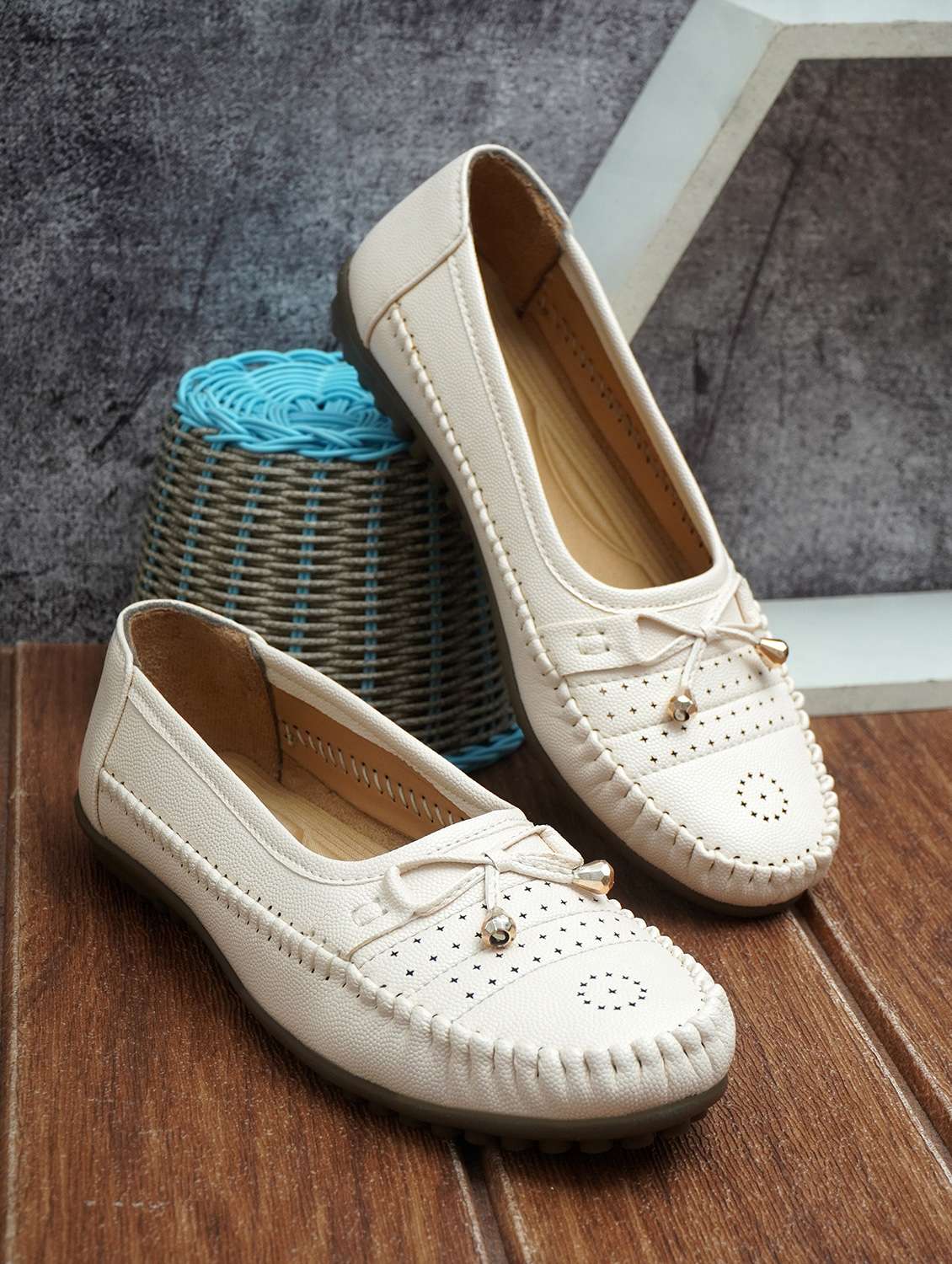 women cream slip on ballerina