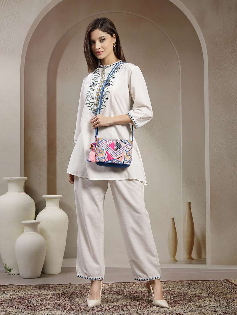 cotton jacquard sling bag with pompom tassel - 22143042 -  Standard Image - 6