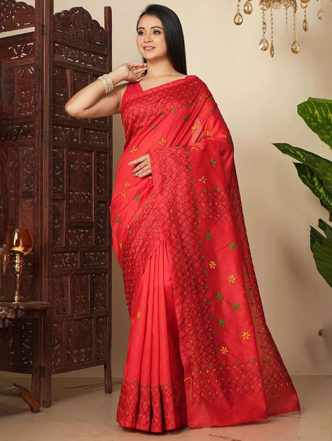 women solid with work embroidered saree with blouse