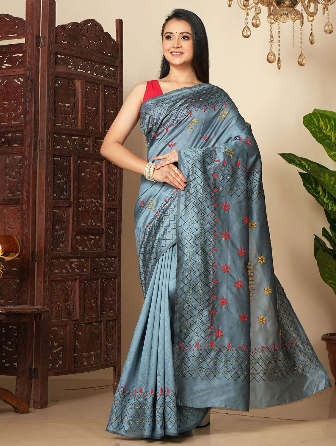 women solid with work embroidered saree with blouse