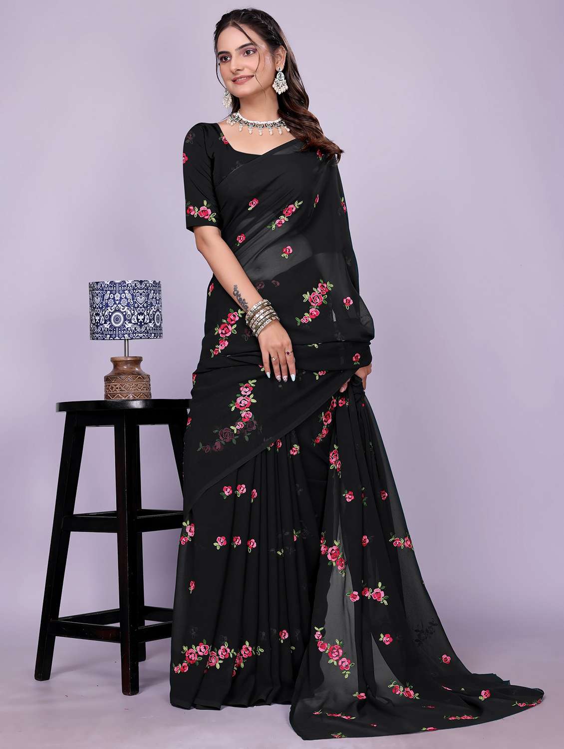 women black embroidered saree with blouse