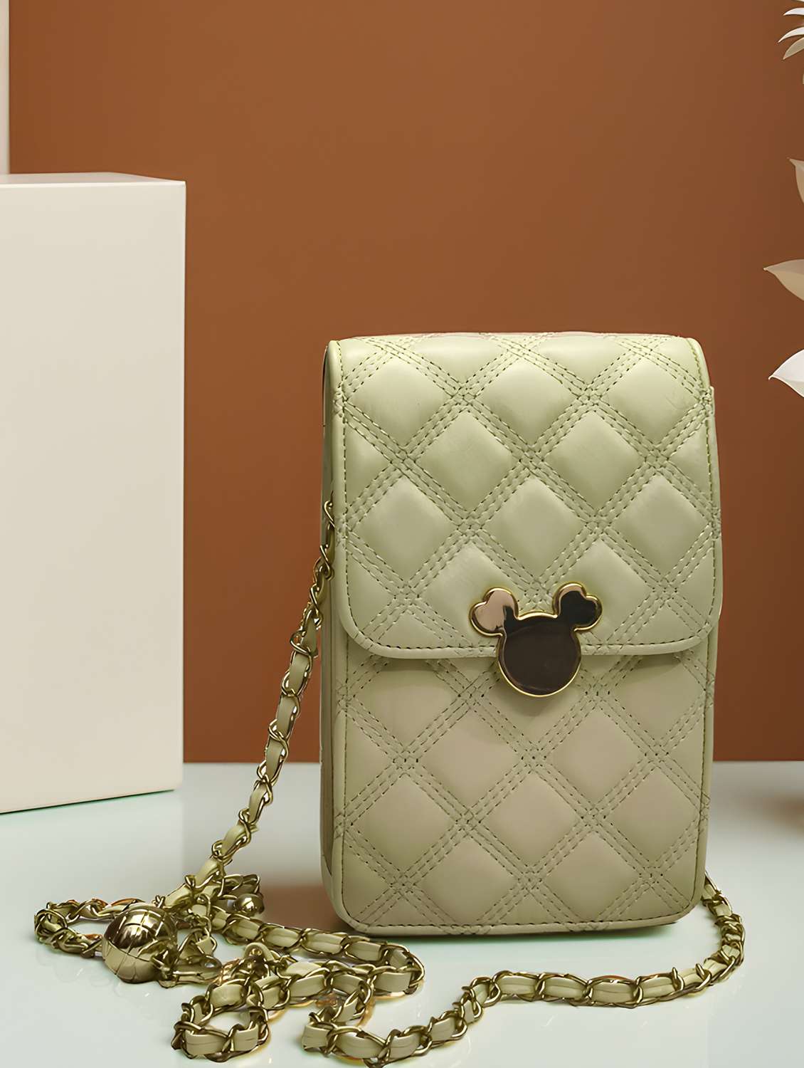 quilted sling bag with chain strap 