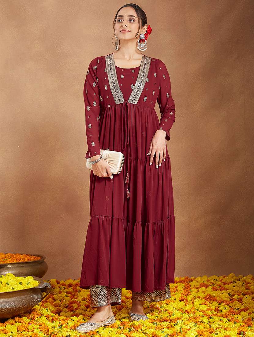 women embroidered long sleeve kurta pant set