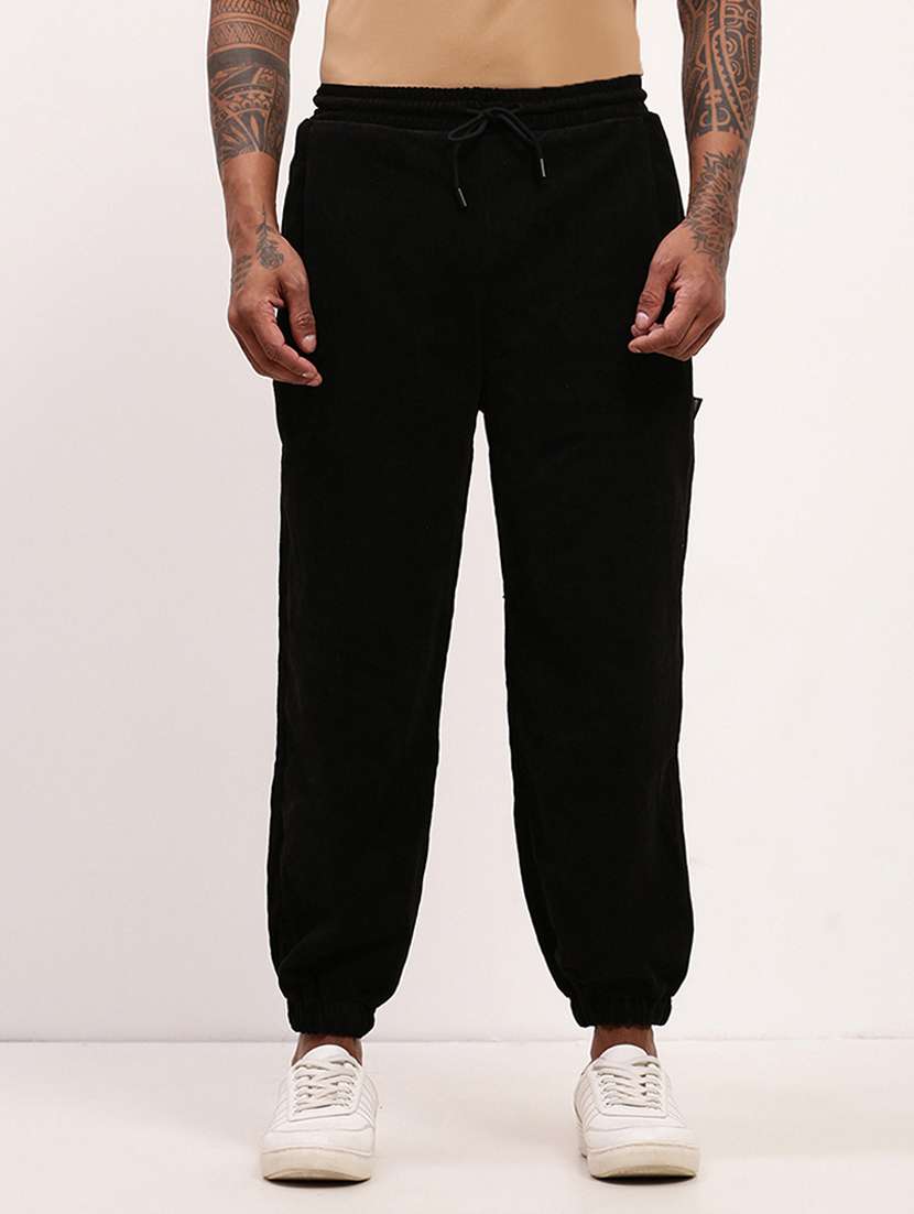   men solid mid rise relaxed fit jogger - 22173639 -  Standard Image - 1