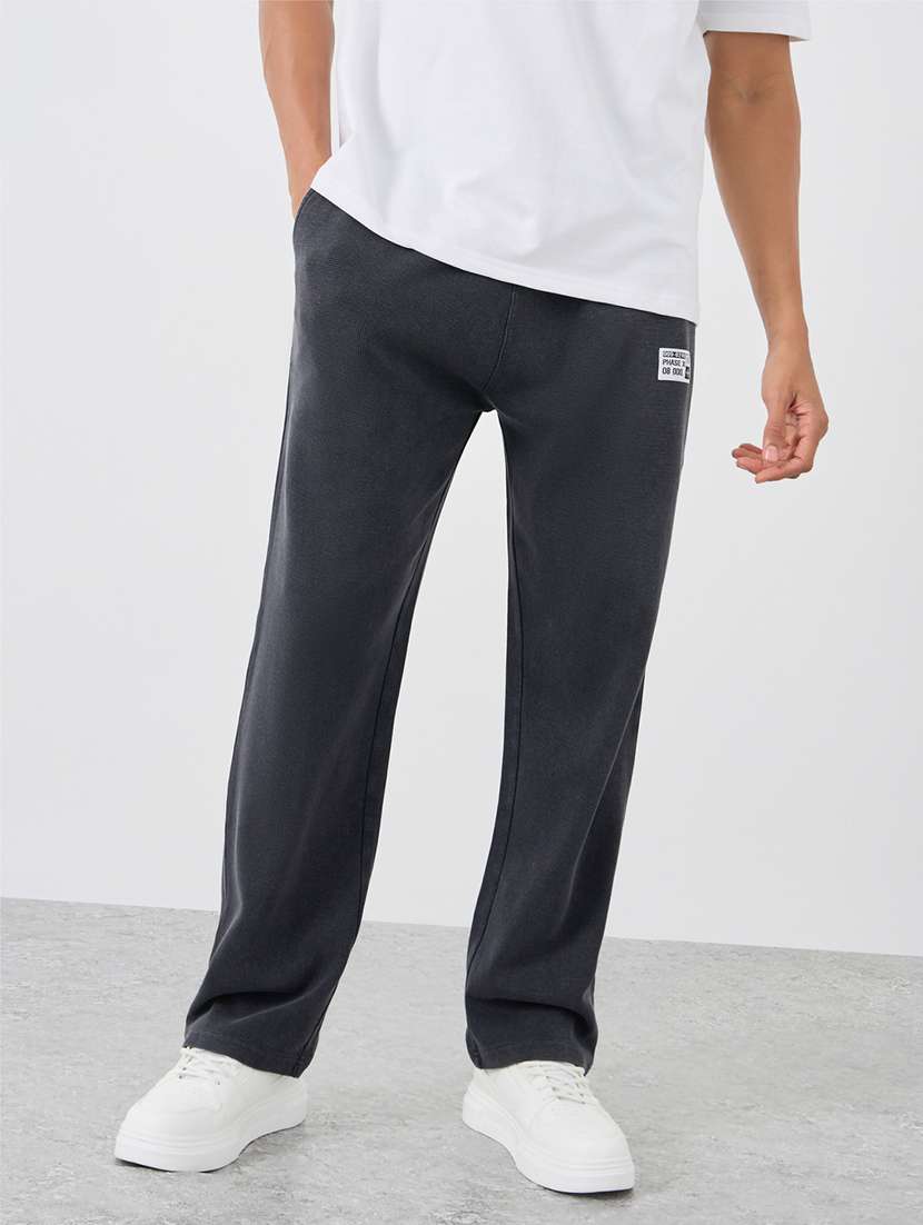 men solid mid rise full length track pant