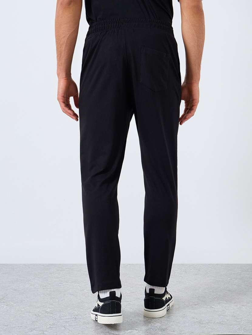 men solid mid rise full length track pant - 22174778 -  Standard Image - 1