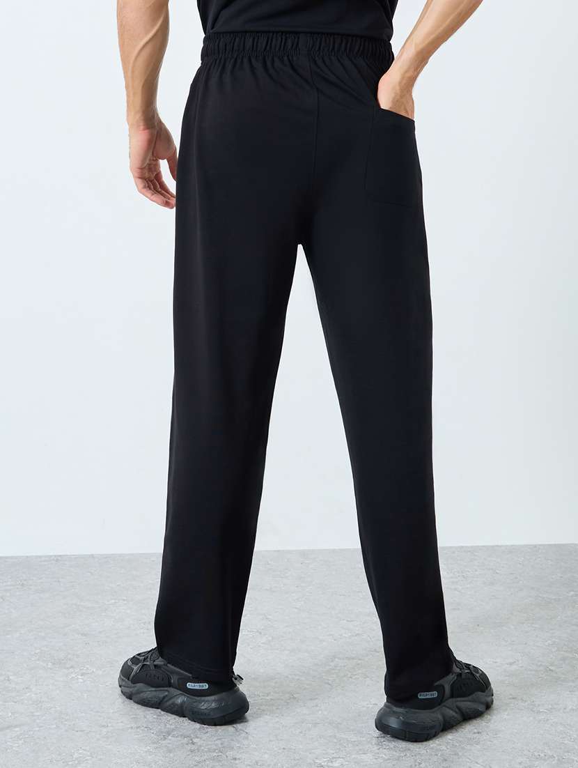 men solid mid rise full length track pant - 22174786 -  Standard Image - 1