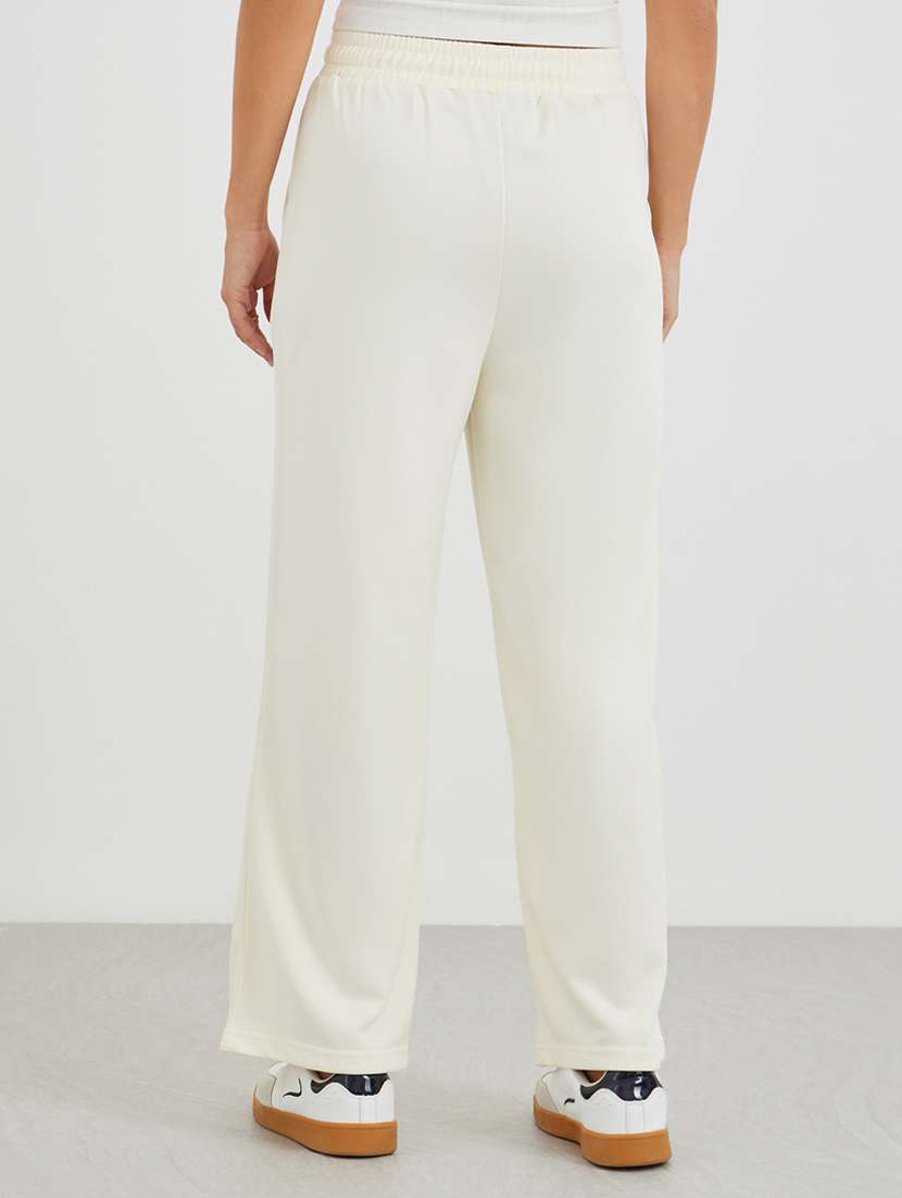 women solid mid rise track pant - 22176730 -  Standard Image - 1