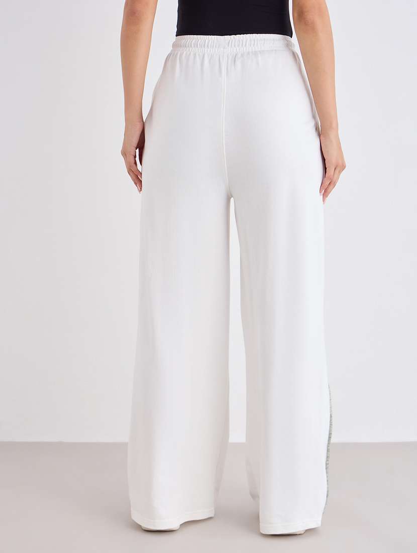 women solid mid rise track pant - 22176739 -  Standard Image - 1