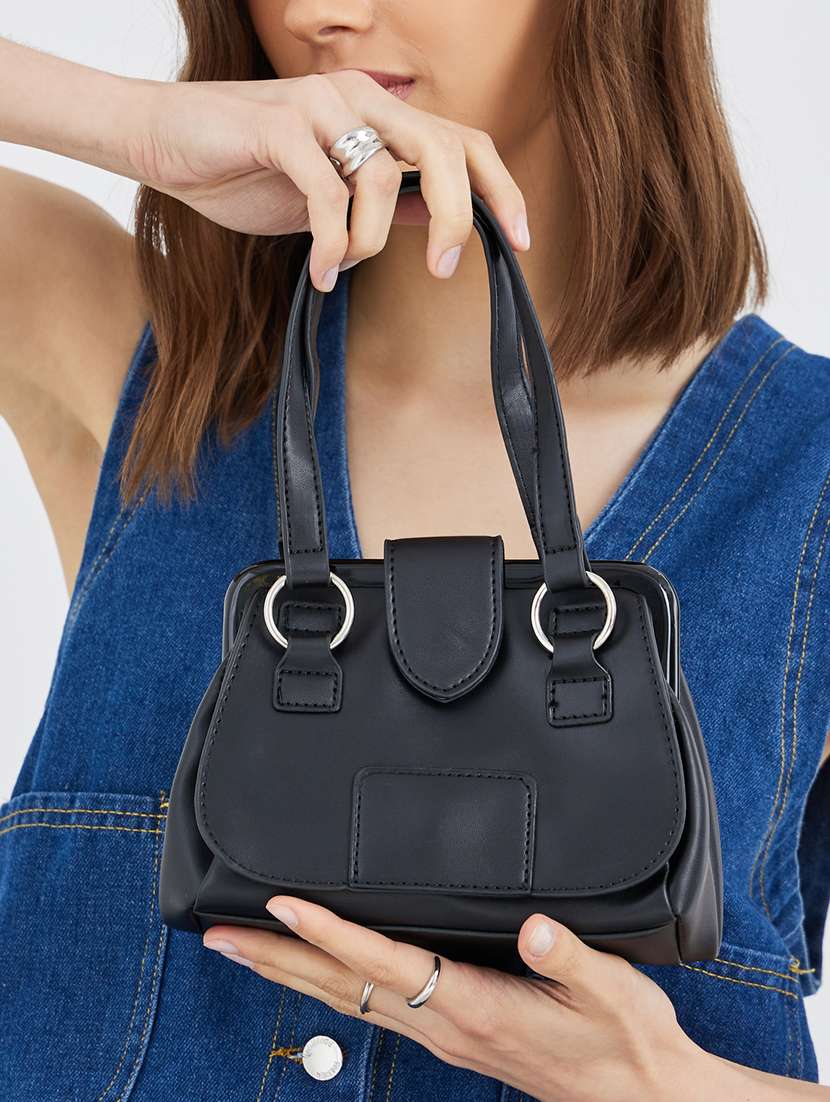 women black solid handbag