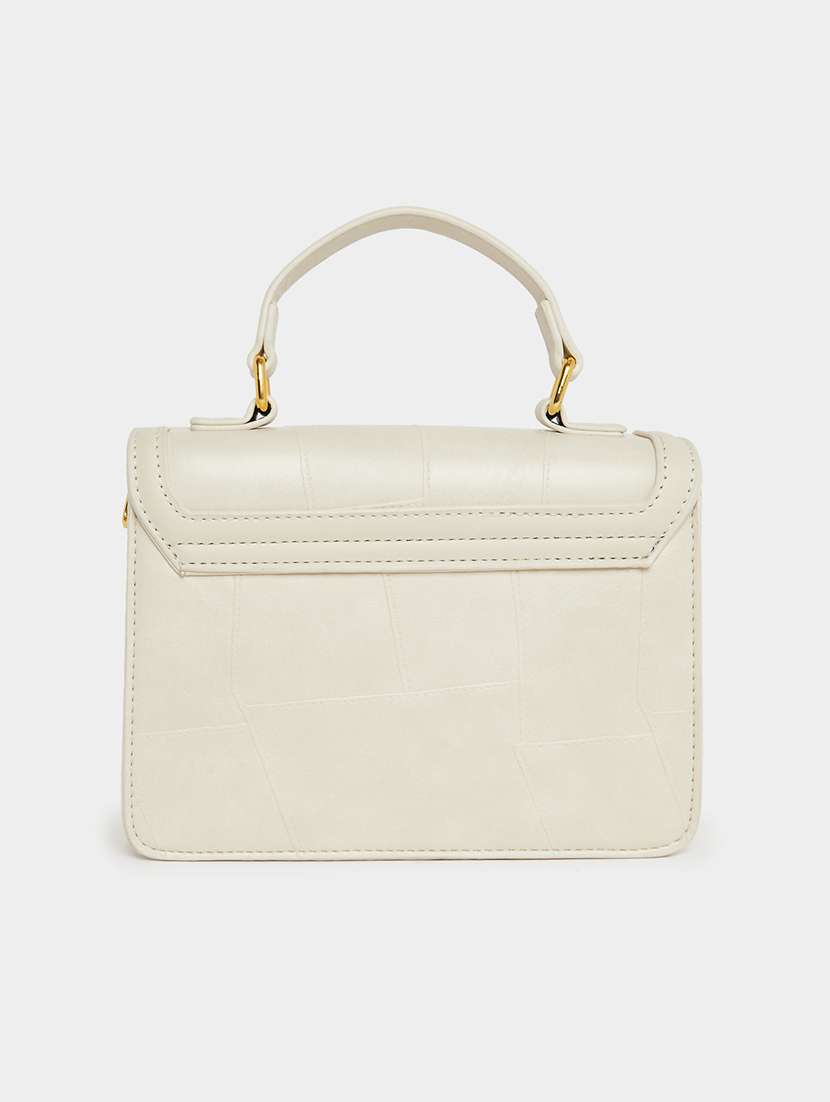 women cream solid handbag - 22176753 -  Standard Image - 1