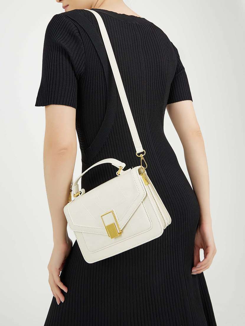 women cream solid handbag - 22176753 -  Standard Image - 4