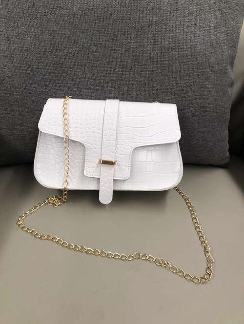 women white solid handbag - 22176761 -  Standard Image - 0
