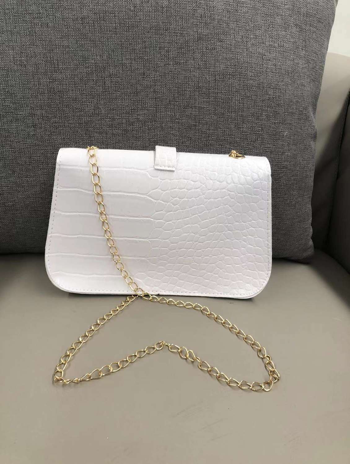 women white solid handbag - 22176761 -  Standard Image - 1