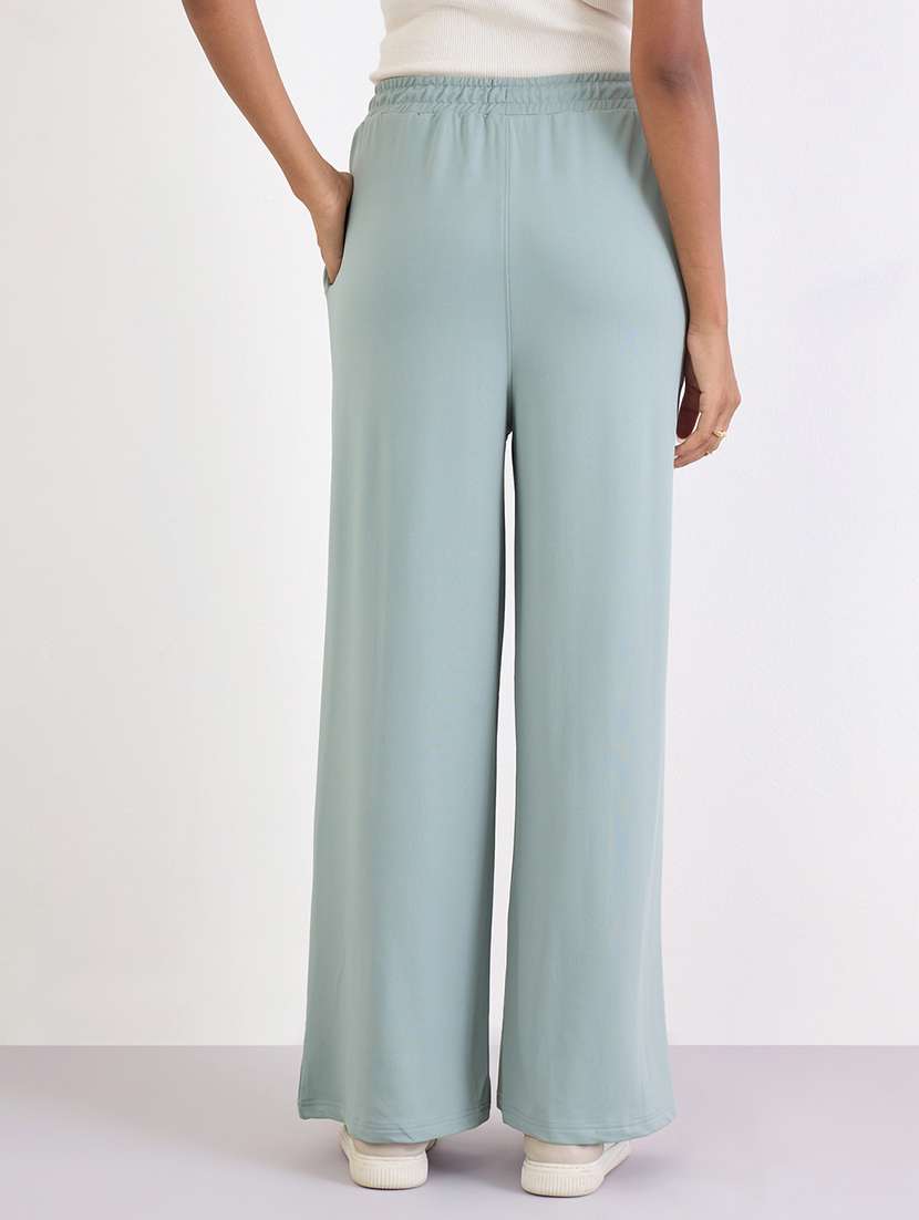 women solid high rise relaxed fit track pant - 22219924 -  Standard Image - 1