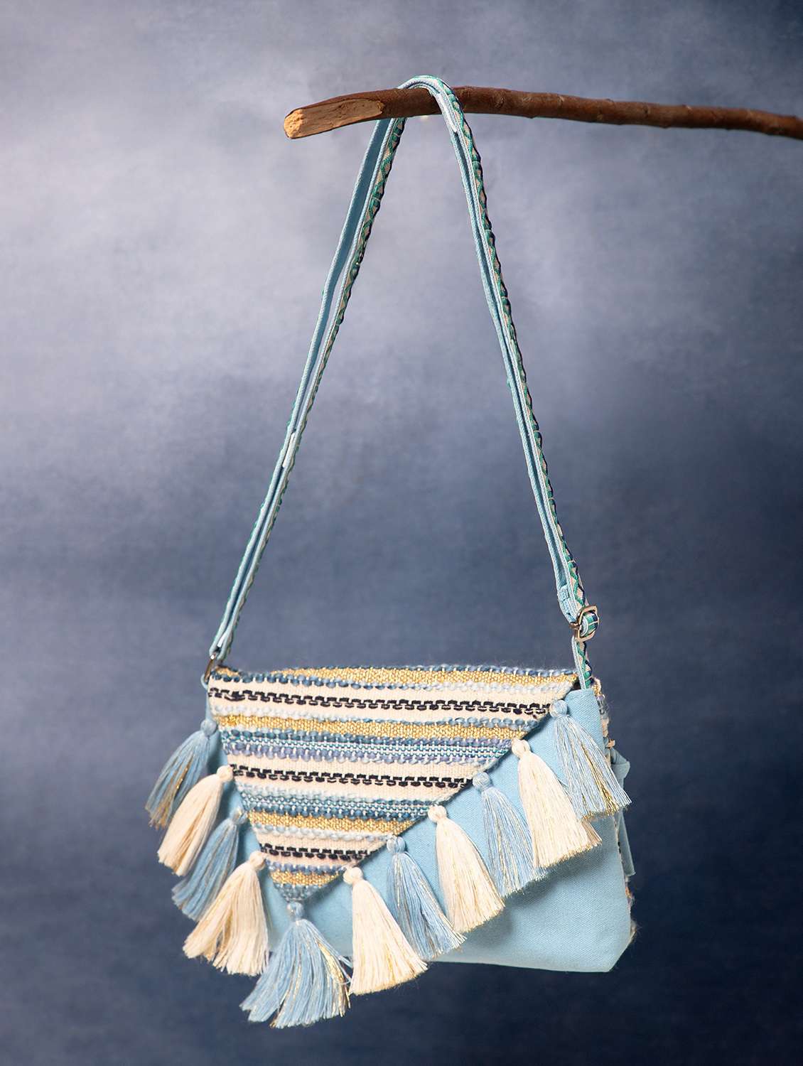 women striped sling bag with tassels