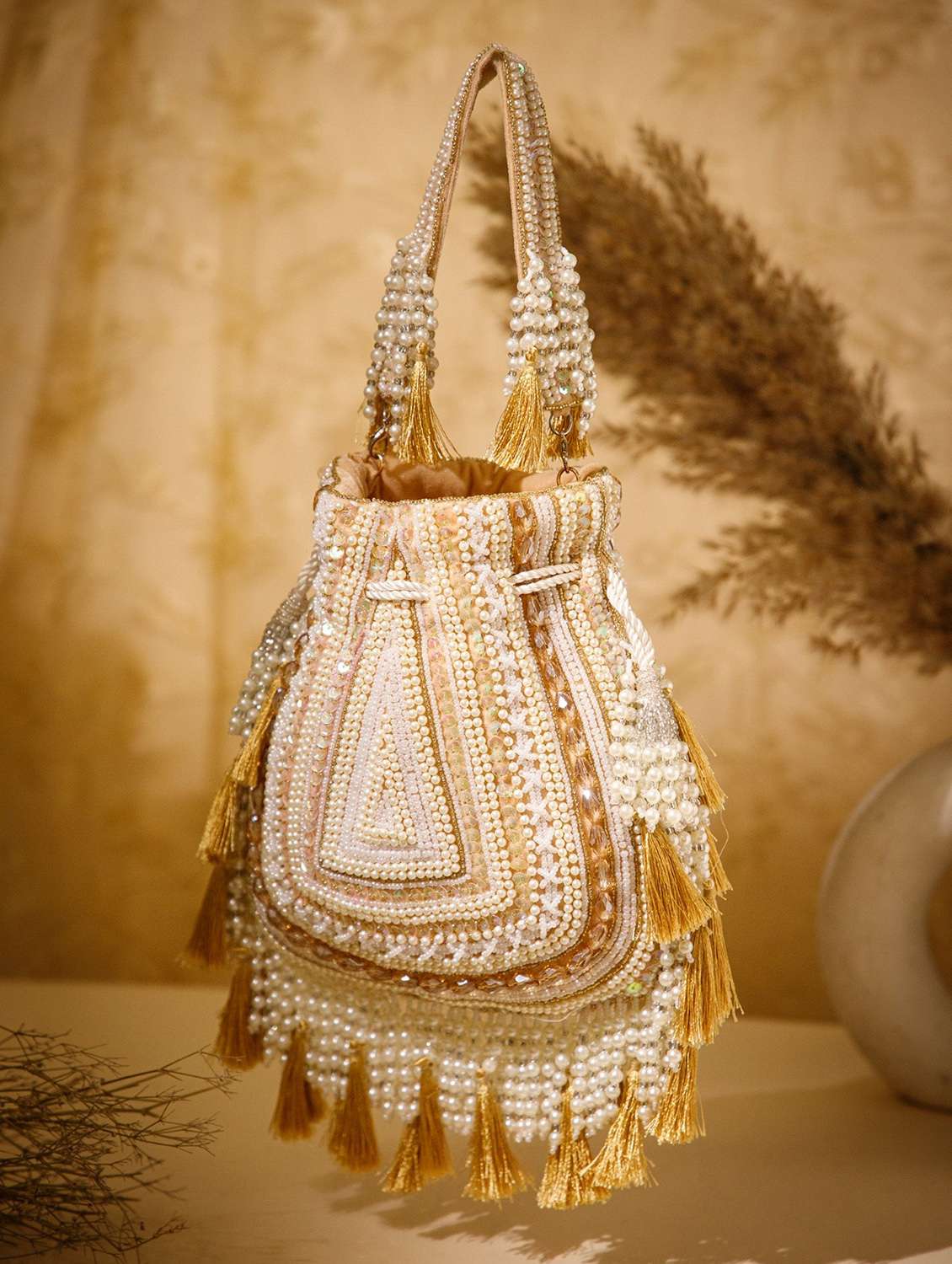 embroidered velvet ethnic potli with tassels