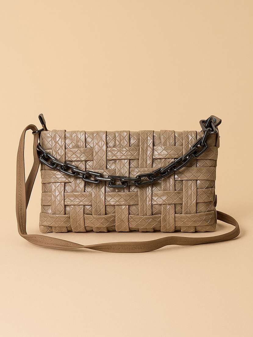 women woven sling bag with chain detail