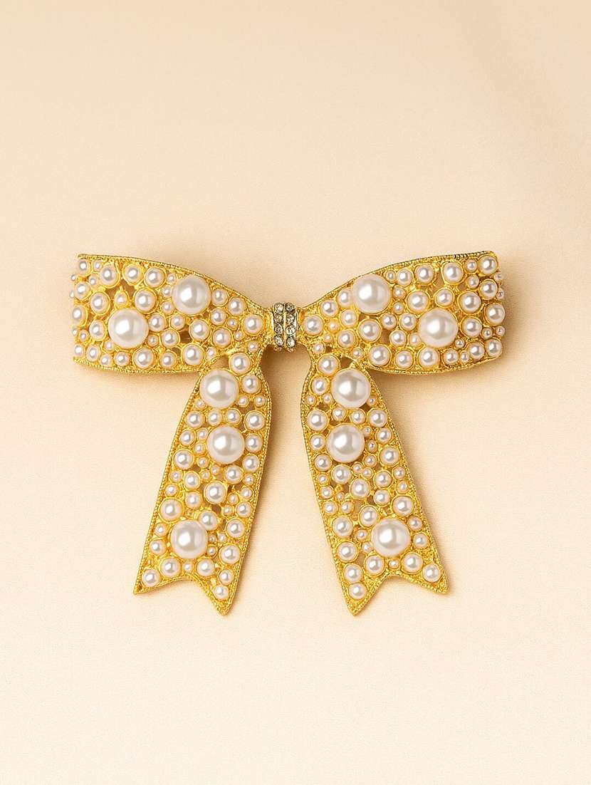 pearl bow hair clip with gold detail - 22228733 -  Standard Image - 1