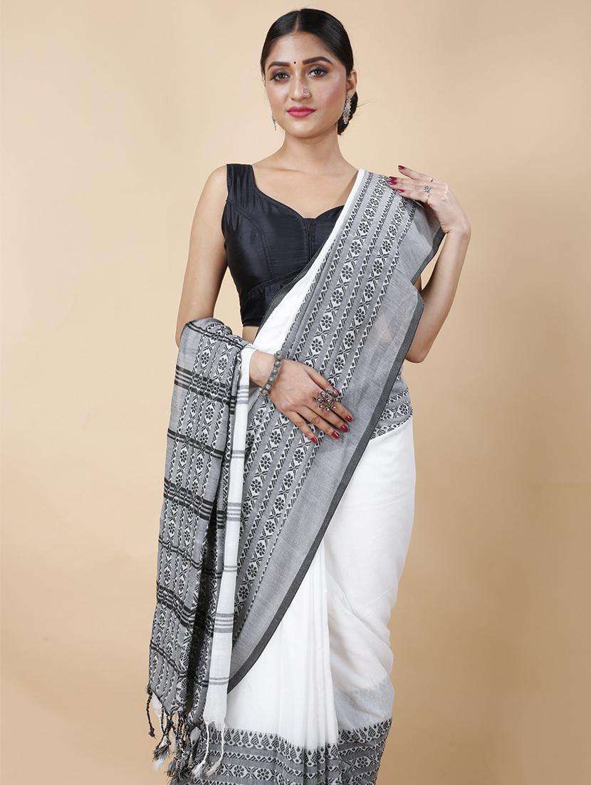women solid with bordered handloom saree - 22260777 -  Standard Image - 1