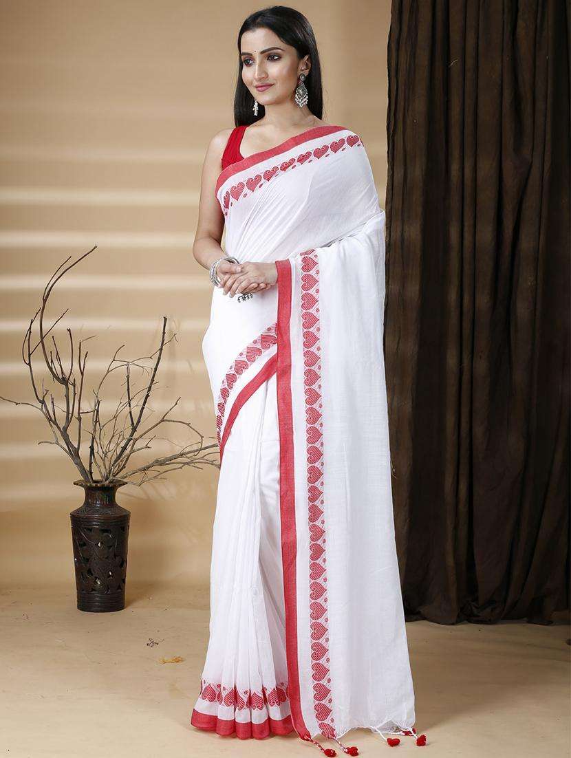 women solid with bordered handloom saree