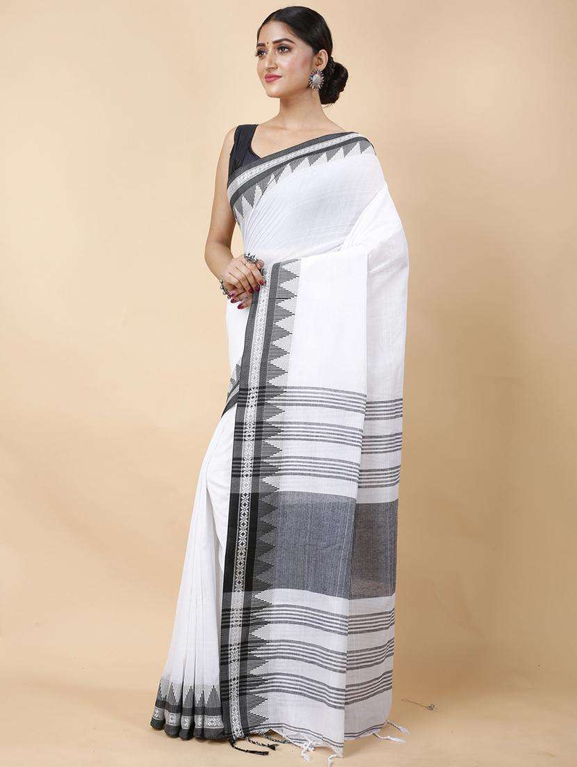 women solid with bordered handloom saree - 22261339 -  Standard Image - 1