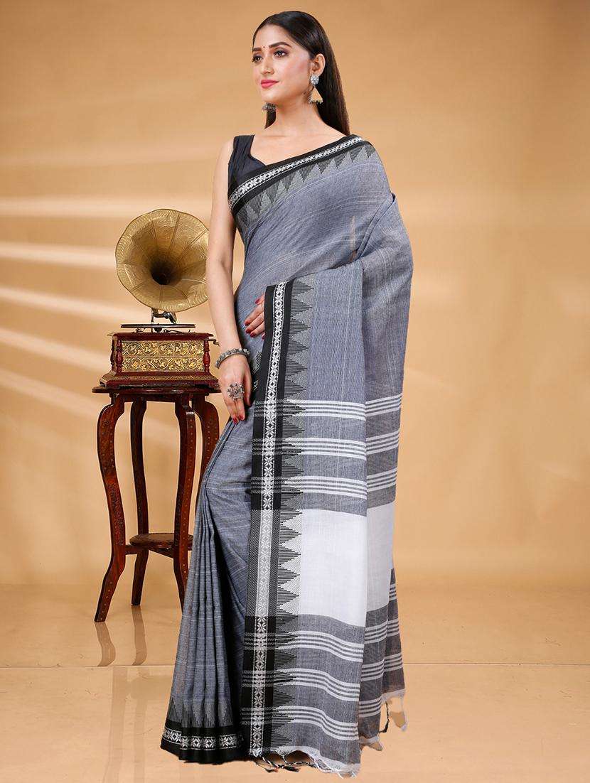 women solid with bordered handloom saree - 22261461 -  Standard Image - 1
