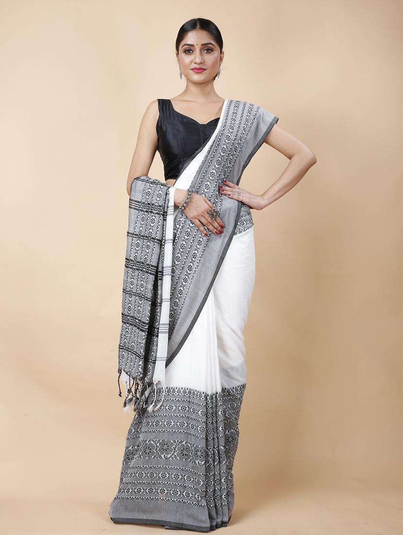 women solid with bordered handloom saree - 22261484 -  Standard Image - 1