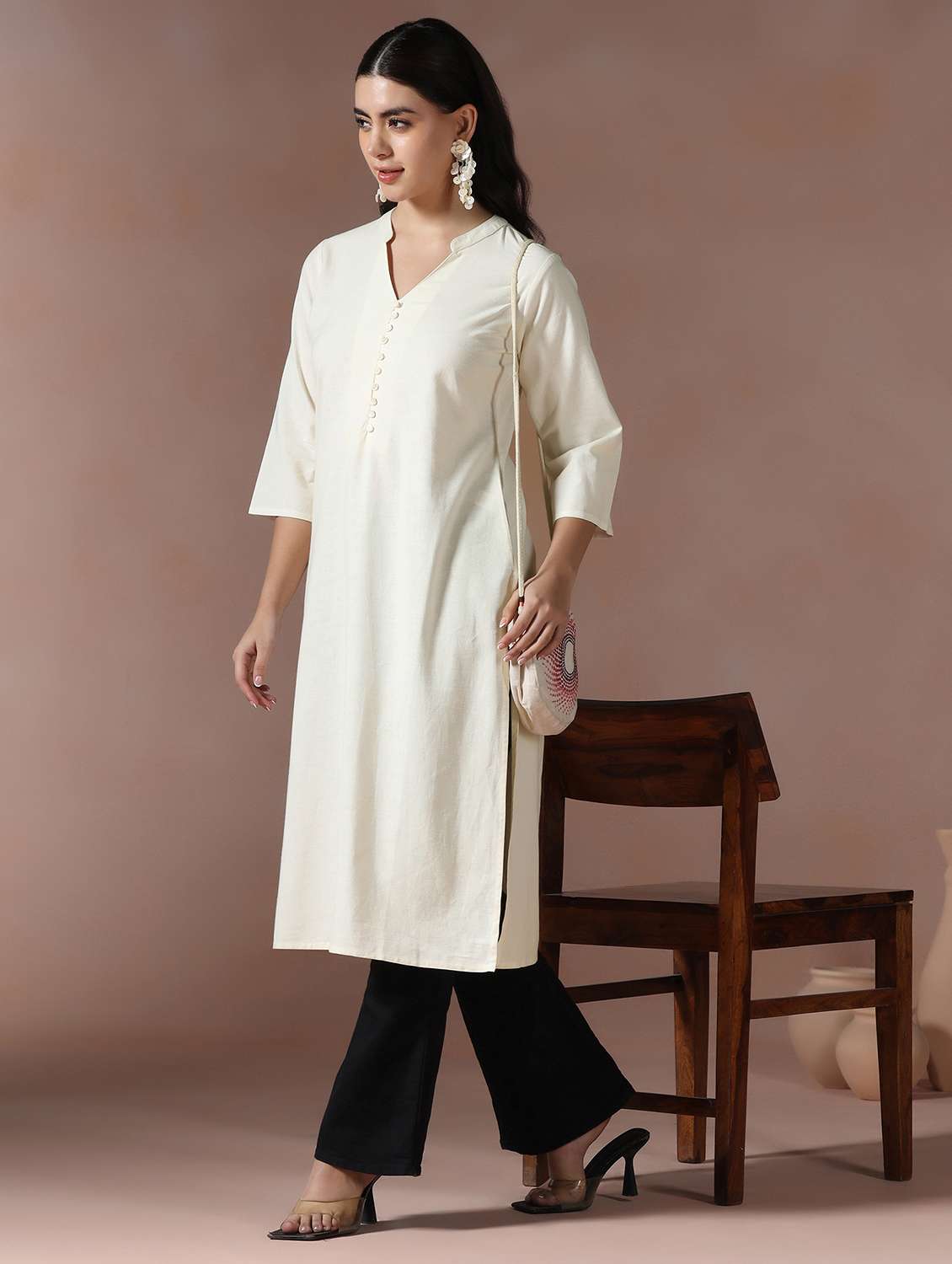 women solid three quarter sleeve straight kurta 
