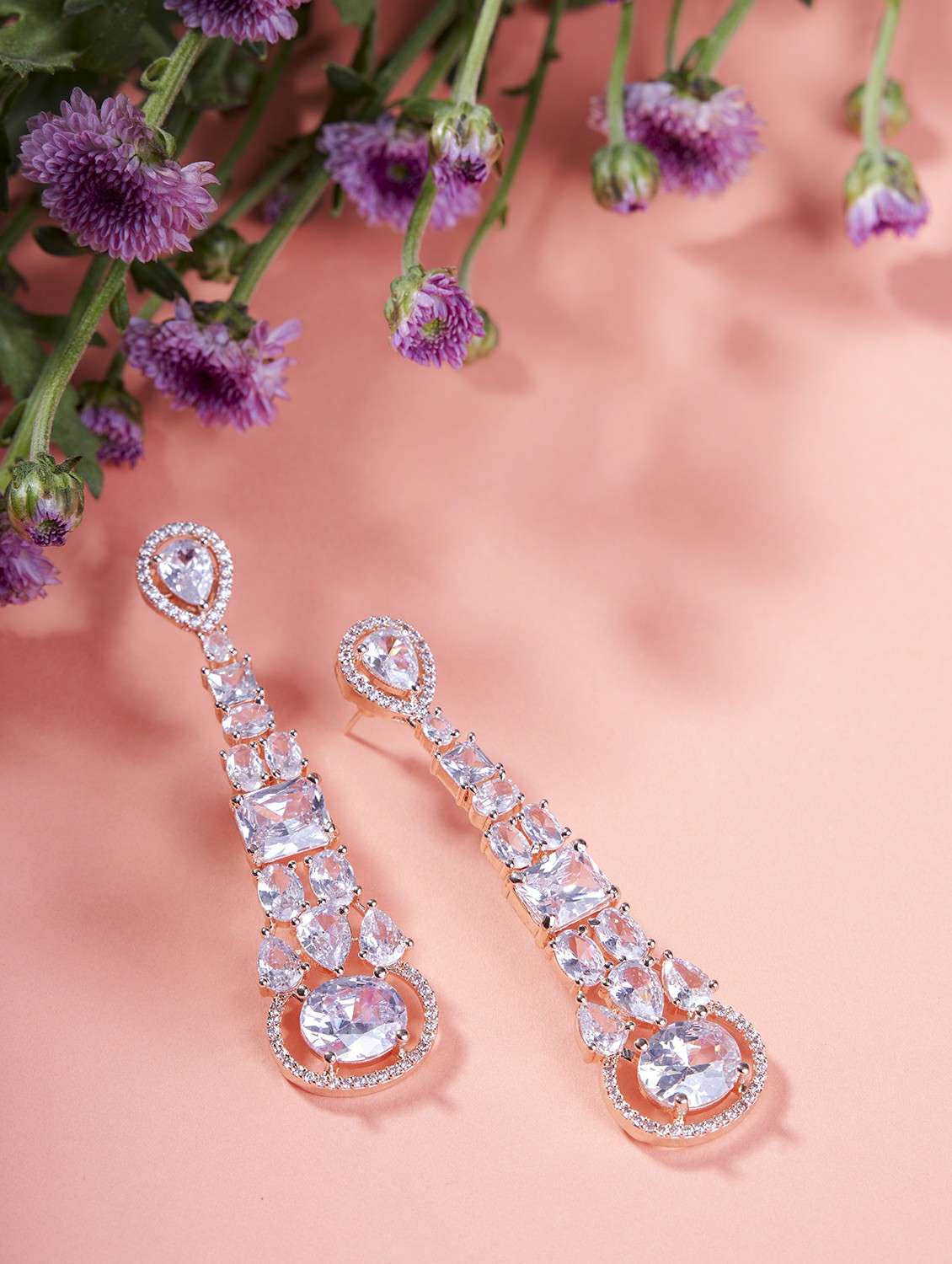 women stone studded dangle earrings