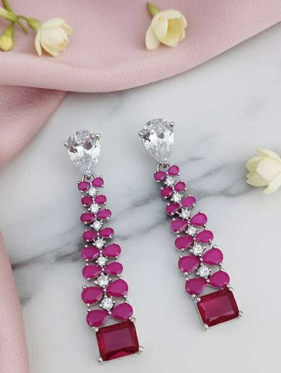 women stone studded dangle earrings