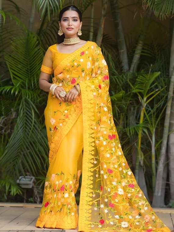 women solid with work embroidered saree with blouse